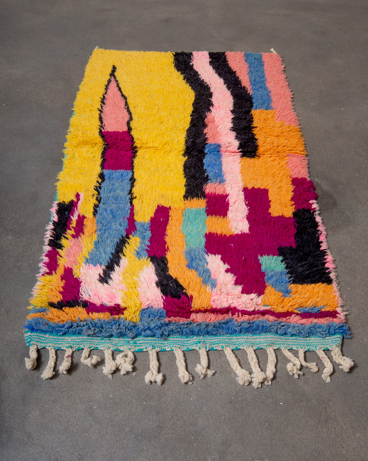 Modern, designer, handcrafted Berber rug from Morocco. Vintage carpet with beautiful colours and patterns and fluffy texture.